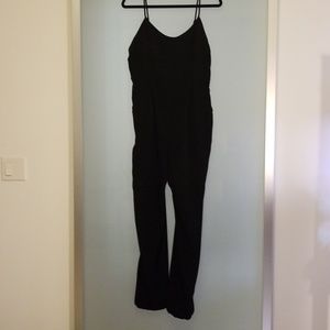 NWT Caged back black jumpsuit w/ pockets